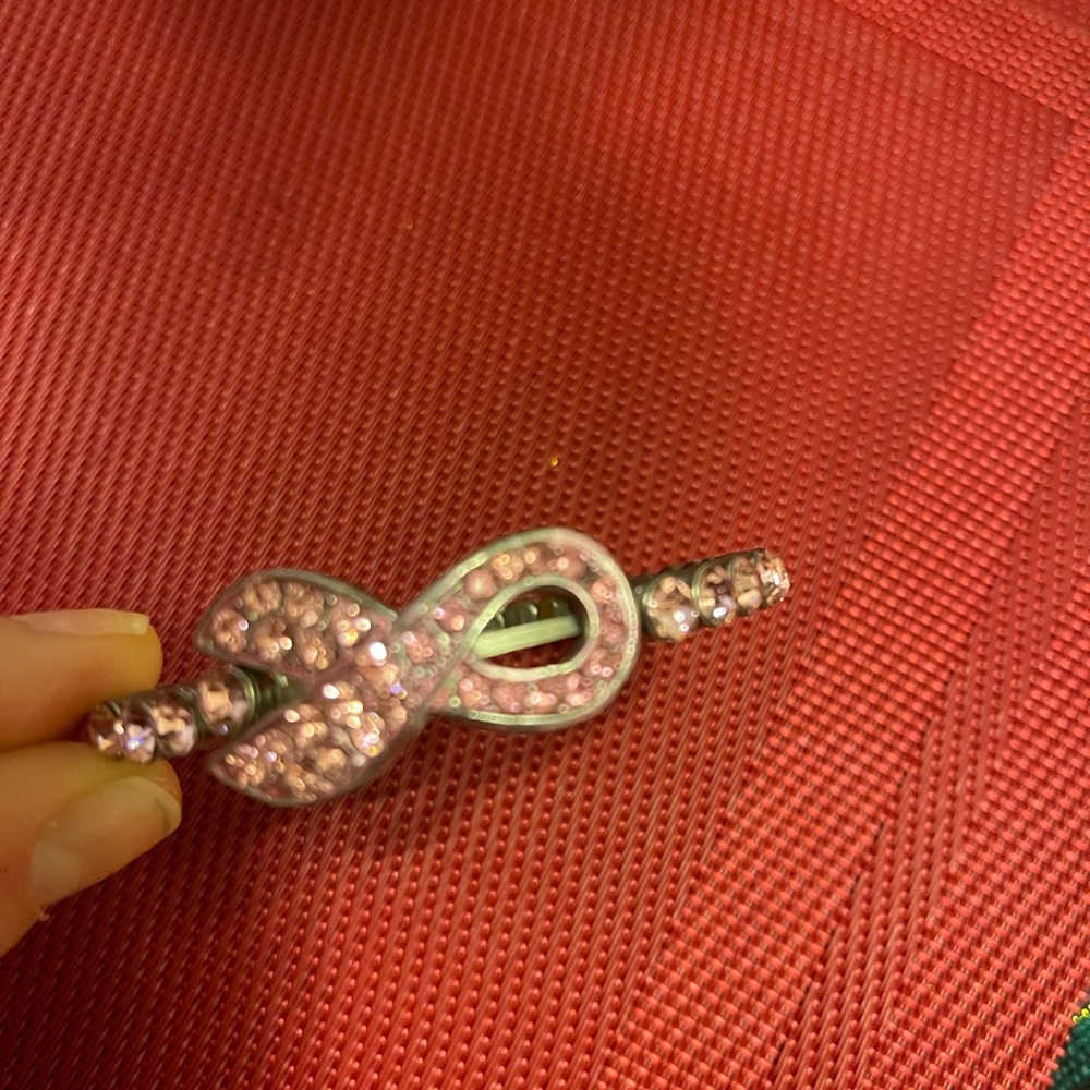 Breast cancer awareness emblem bracelet.